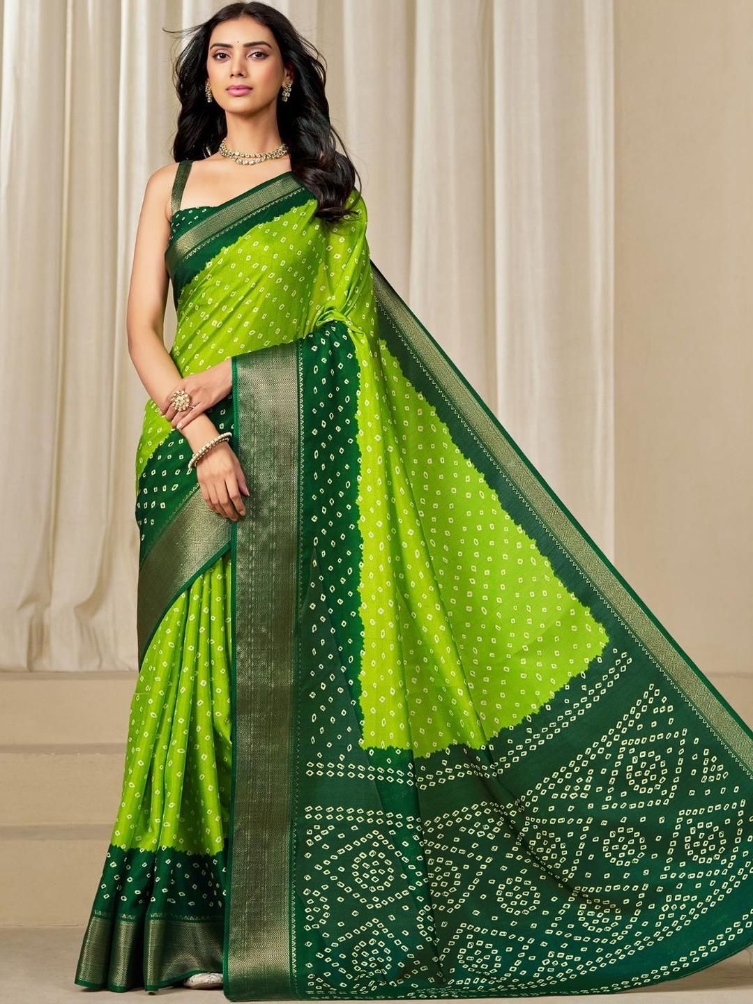 Kalini Women Dola Silk Bandhani Print Zari border Saree