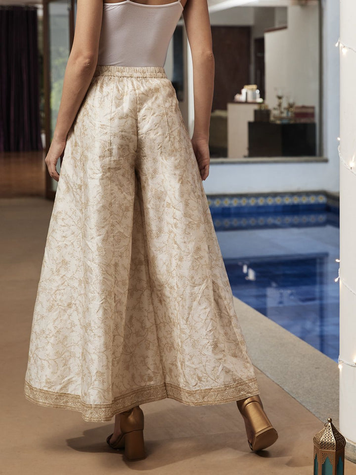 Global Desi Women White & Gold-Toned Floral Printed Flared Trousers