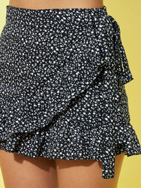Berrylush Women Black Floral Printed Tie-Up Ruffled Wrap Mini Skorts