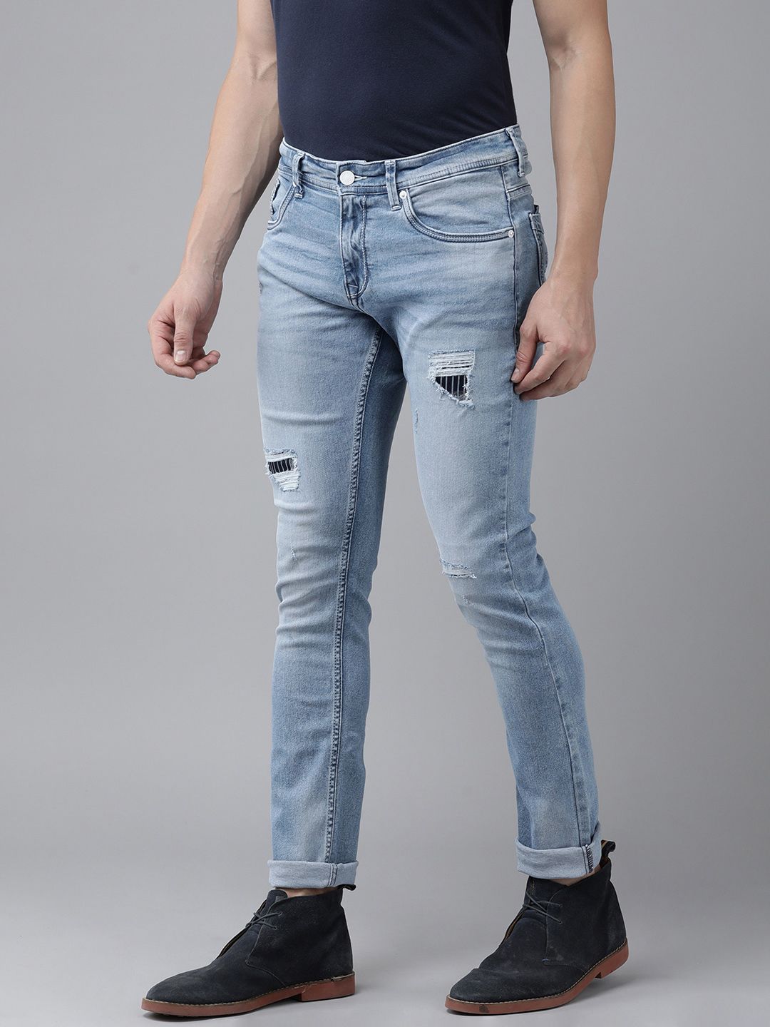 SPYKAR Men Skinny Fit Low-Rise Mildly Distressed Light Fade Stretchable Jeans