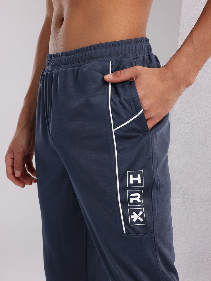 HRX by Hrithik Roshan Men Brand Logo Printed Mid-Rise Rapid-Dry Training Joggers