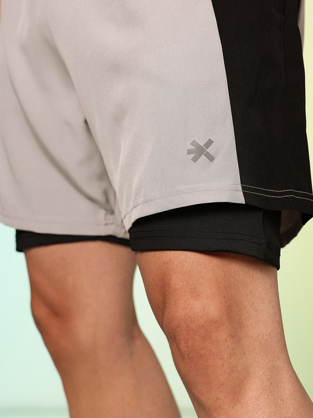 HRX by Hrithik Roshan Men Colourblocked Running Sports Shorts with Attached Tights