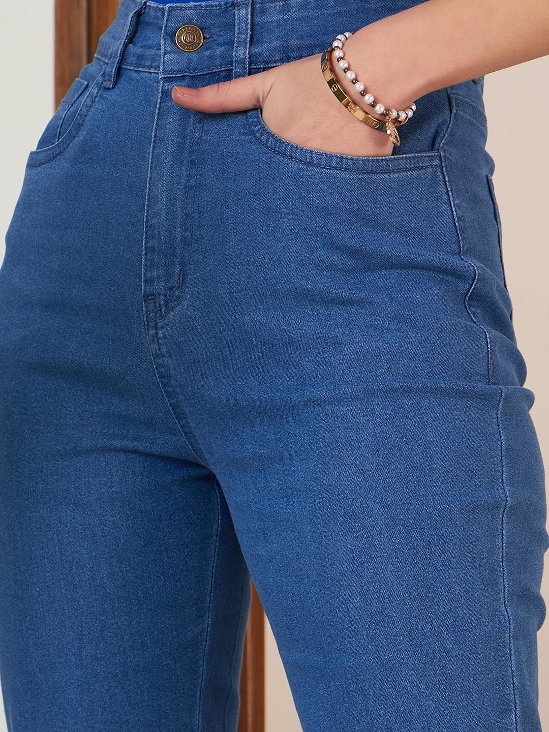 Berrylush Blue Women Bootcut High-Rise Mildly Distressed Stretchable Light Fade Jeans