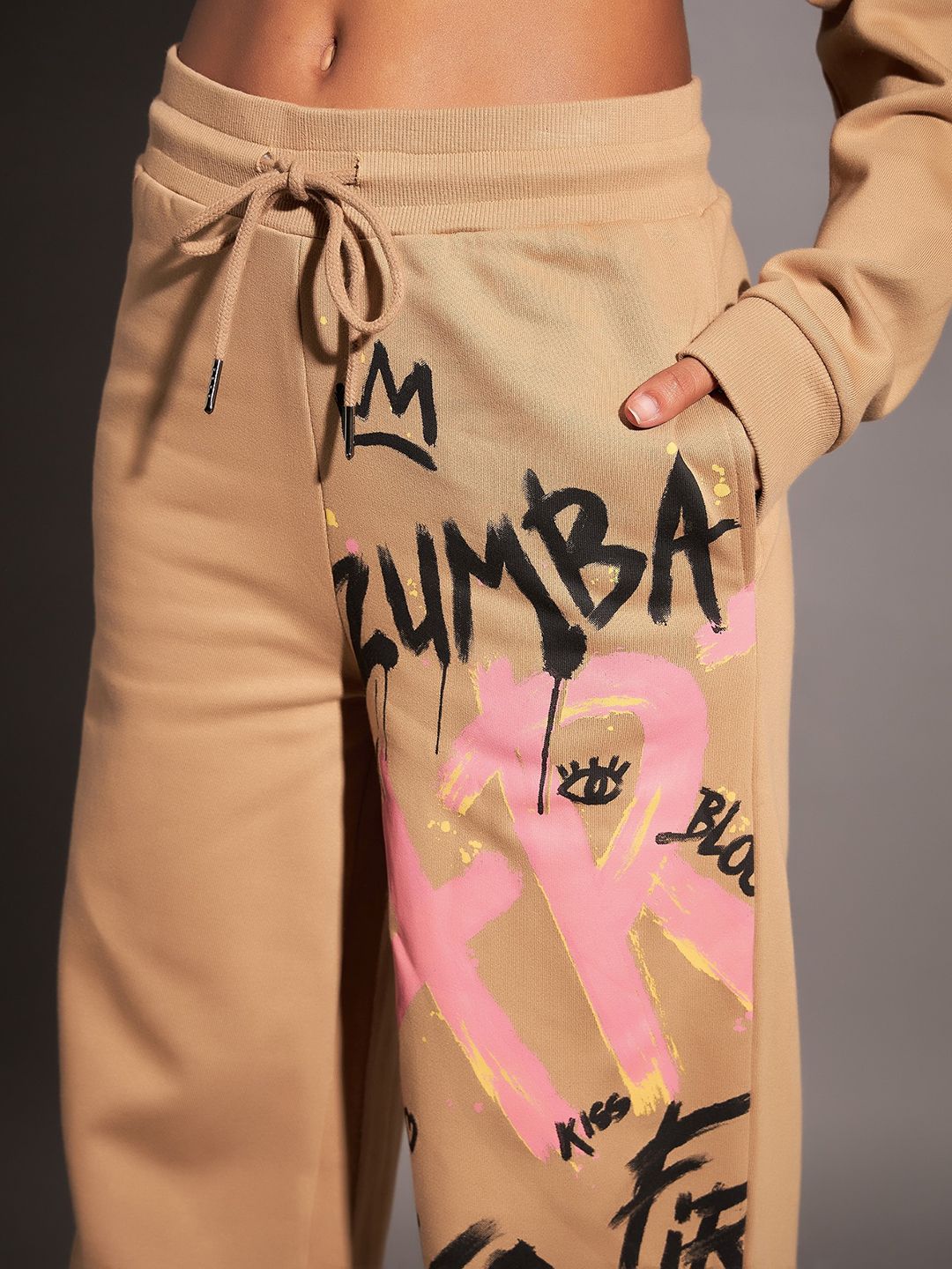 SASSAFRAS Women Beige Relaxed Fit Mid-Rise Typography Printed Fleece Track Pants