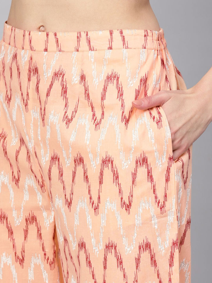 Gerua By Libas Women Peach-Coloured  Red Printed Kurta with Trousers