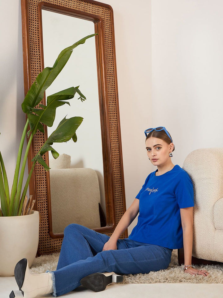 Berrylush Blue Women Bootcut High-Rise Mildly Distressed Stretchable Light Fade Jeans