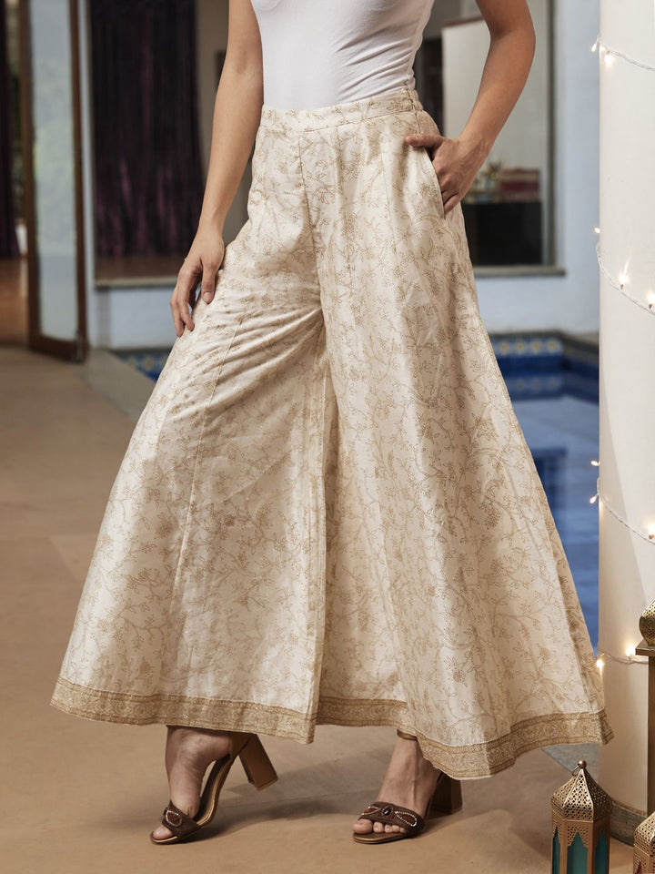 Global Desi Women White & Gold-Toned Floral Printed Flared Trousers