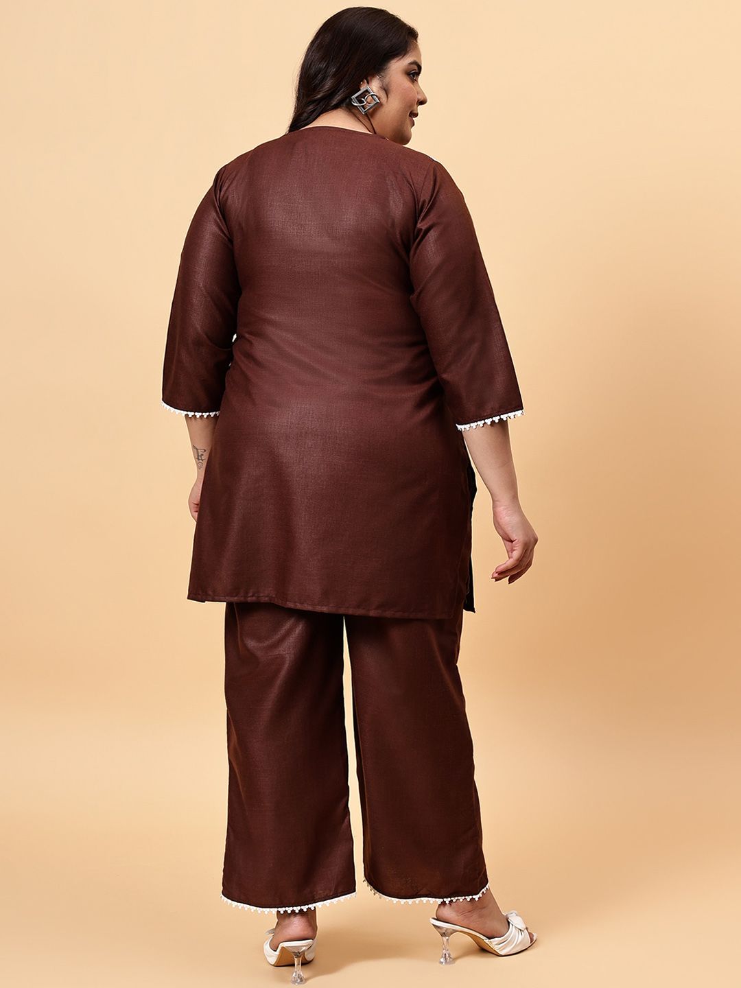 Bani Women Embroidered V Neck Tunic With Flared Palazzos Co-Ords