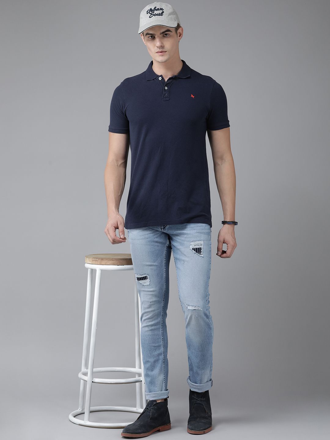 SPYKAR Men Skinny Fit Low-Rise Mildly Distressed Light Fade Stretchable Jeans