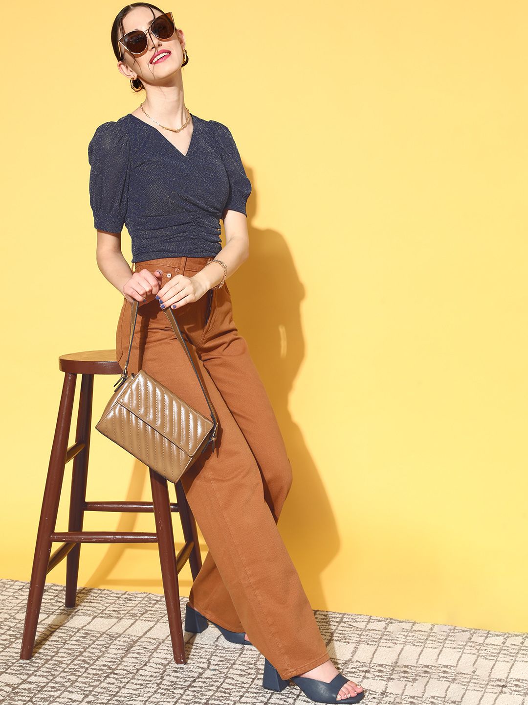 Antheaa Women Stunning Navy Blue Solid Volume Play Top