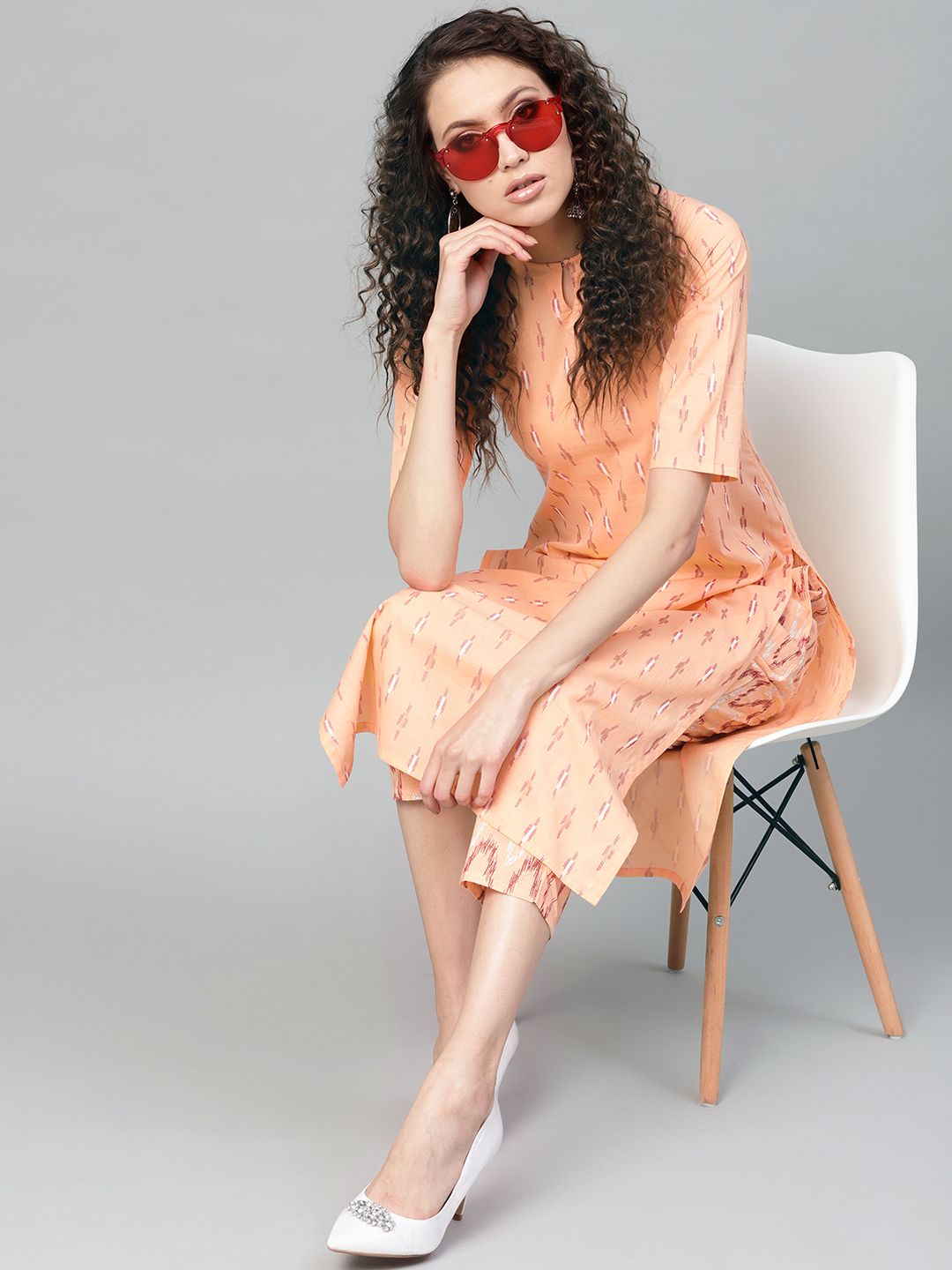 Gerua By Libas Women Peach-Coloured  Red Printed Kurta with Trousers