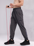 HRX by Hrithik Roshan Men Brand Logo Print Mid-Rise Rapid-Dry Training Cargo-Style Joggers