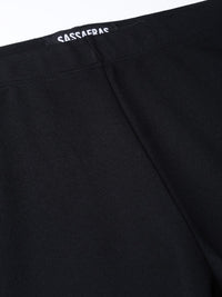 SASSAFRAS Women Black Slim Fit Solid Zip Hem Cropped Treggings