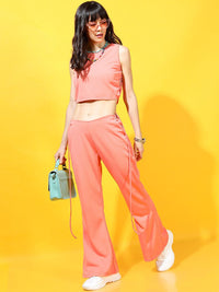 Tokyo Talkies Women Coral Solid Regular Flared Trousers