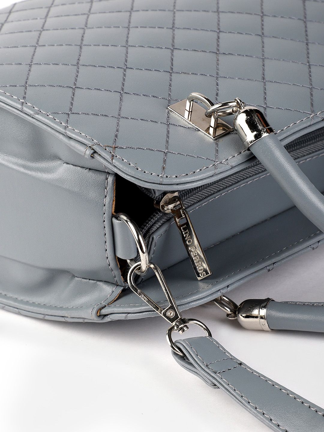 Lino Perros Blue Quilted Handheld Bag