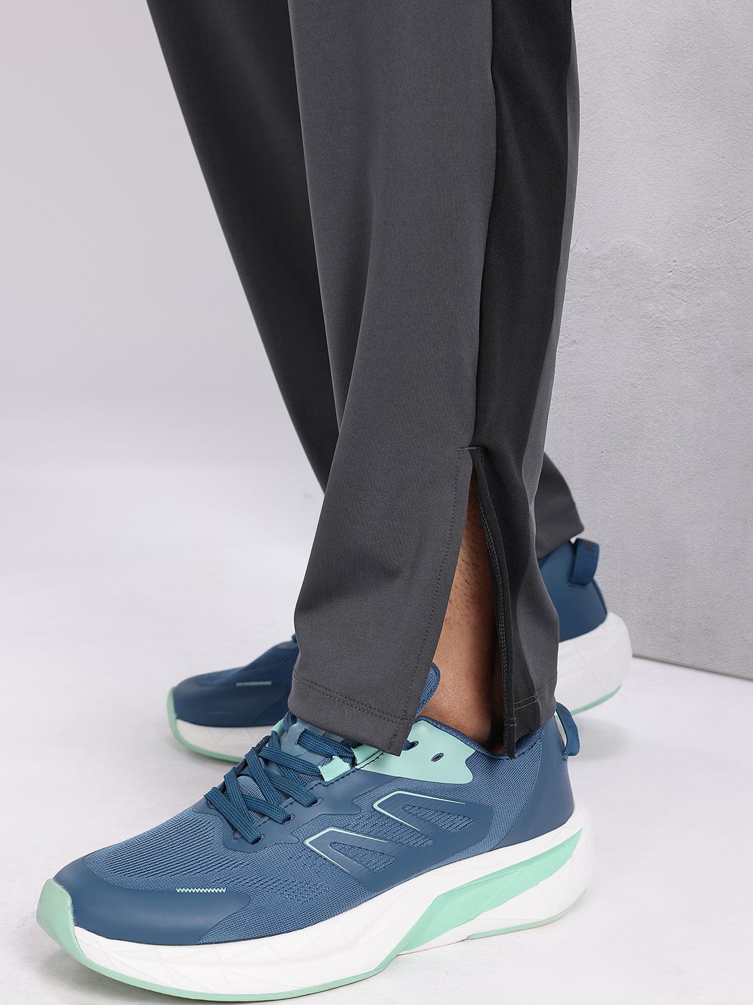 HRX by Hrithik Roshan Men Mid-Rise Rapid-Dry Training Track Pants with Side Stripes