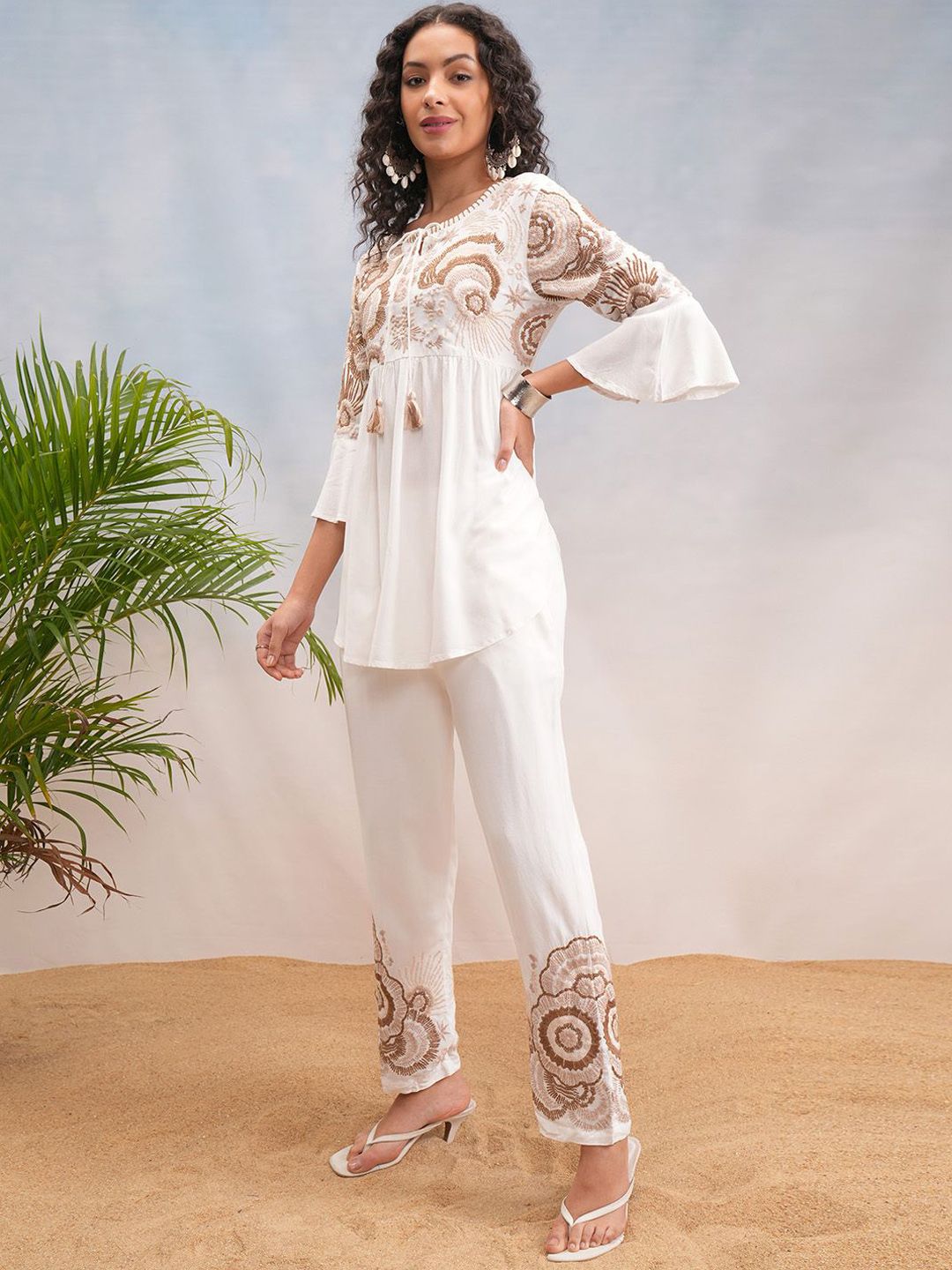 Vishudh Off White Floral Embroidered Bell Sleeves Tie-up Neck Tunic With Trousers