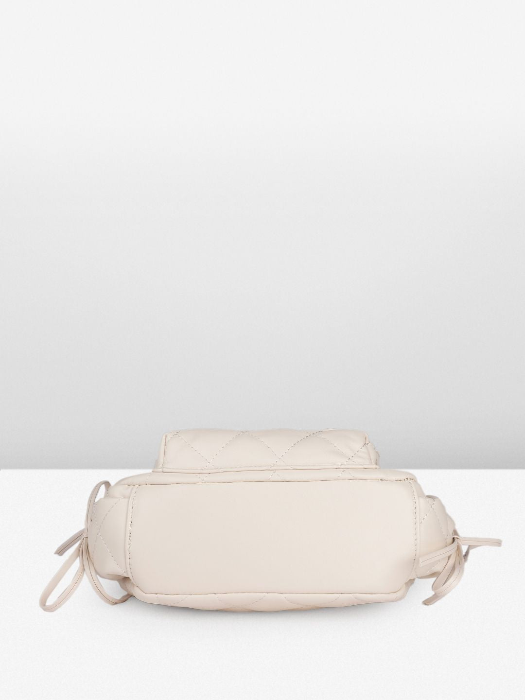 DressBerry Textured Half Moon Sling Bag