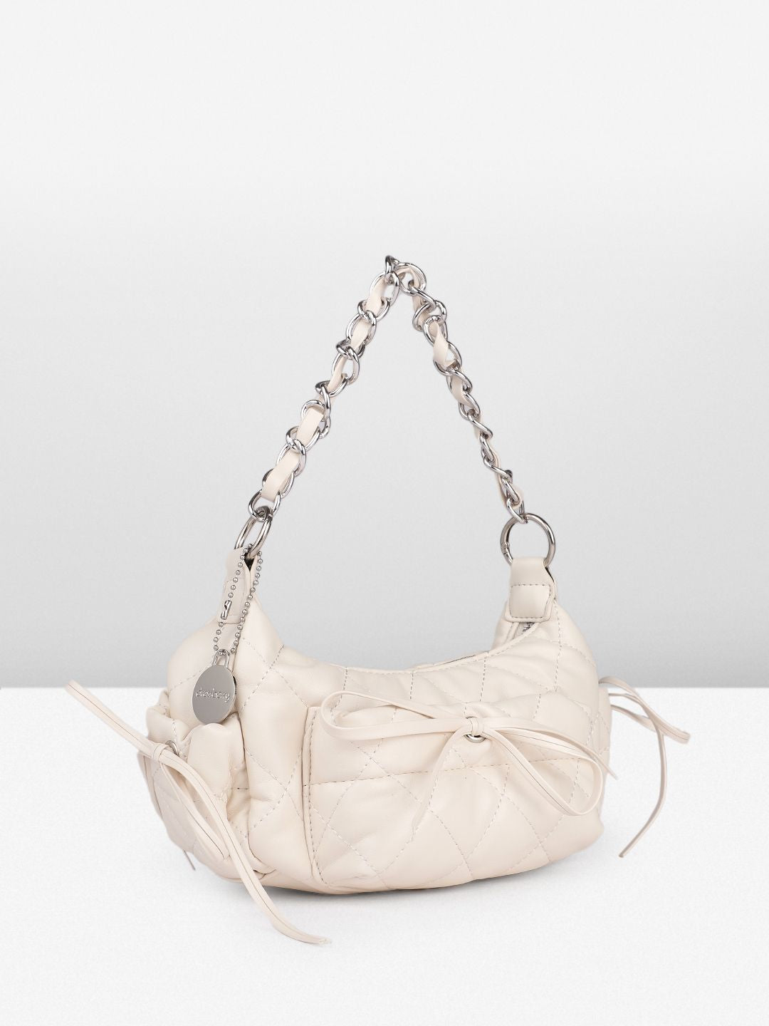 DressBerry Textured Half Moon Sling Bag