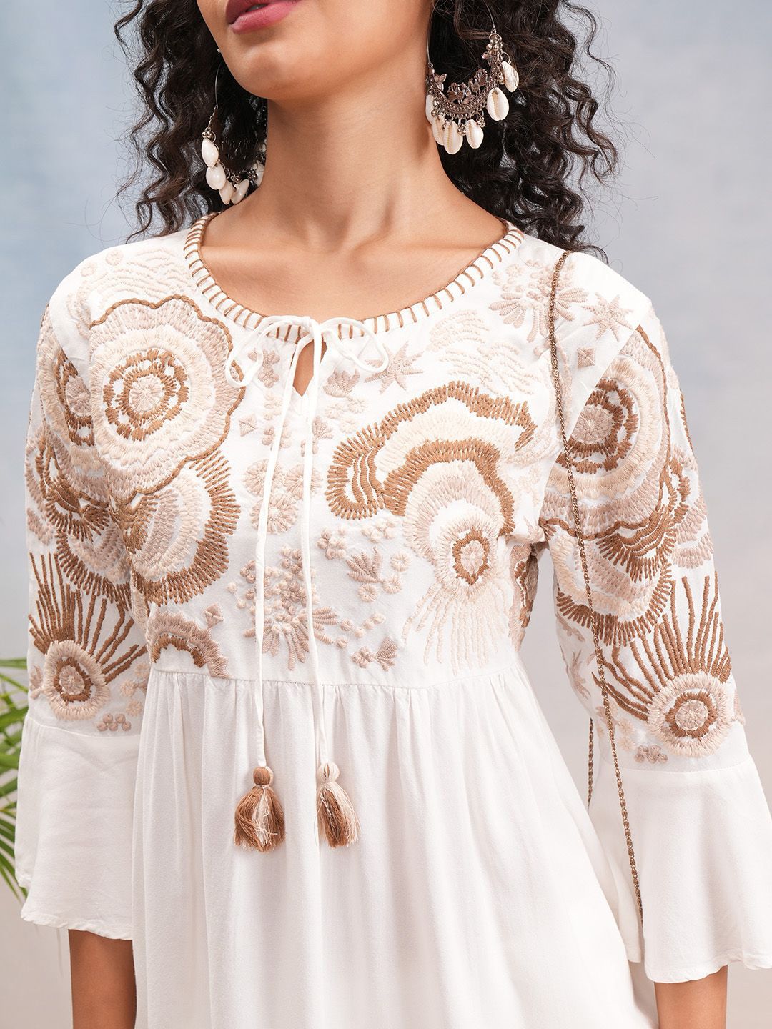 Vishudh Off White Floral Embroidered Bell Sleeves Tie-up Neck Tunic With Trousers