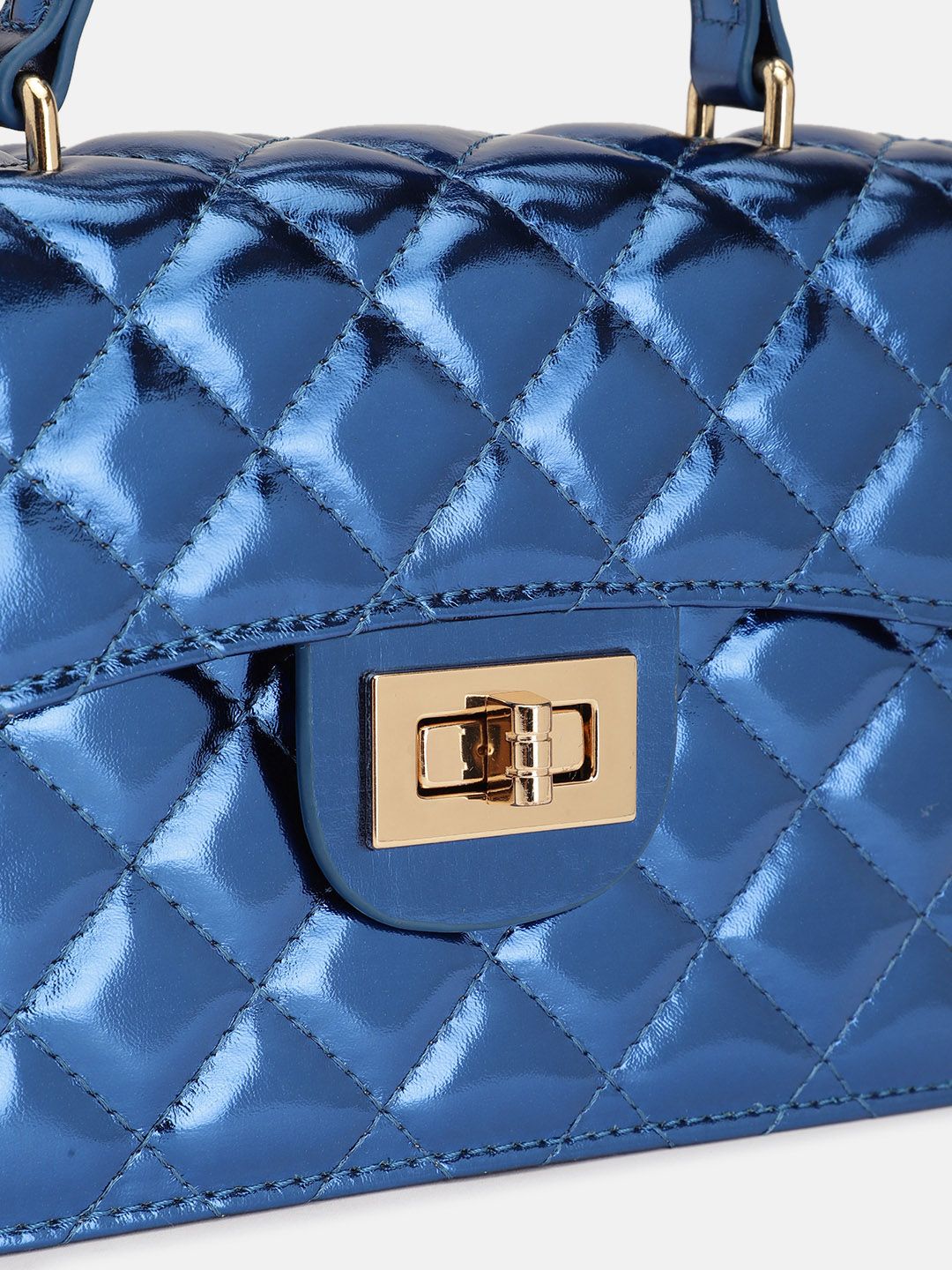 Lino Perros Quilted Structured Handheld Bag