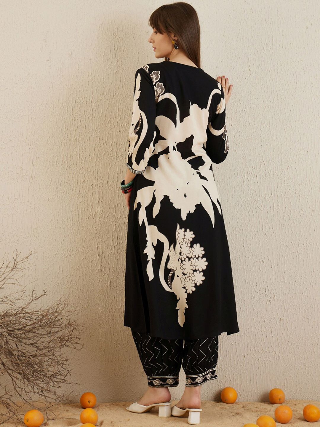 Indo Era Black Floral Printed V-Neck Sequinned A-Line Kurta With Salwar