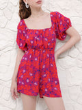 DressBerry Romantic & Flirty Printed Cut-Out Tie-Up Playsuit
