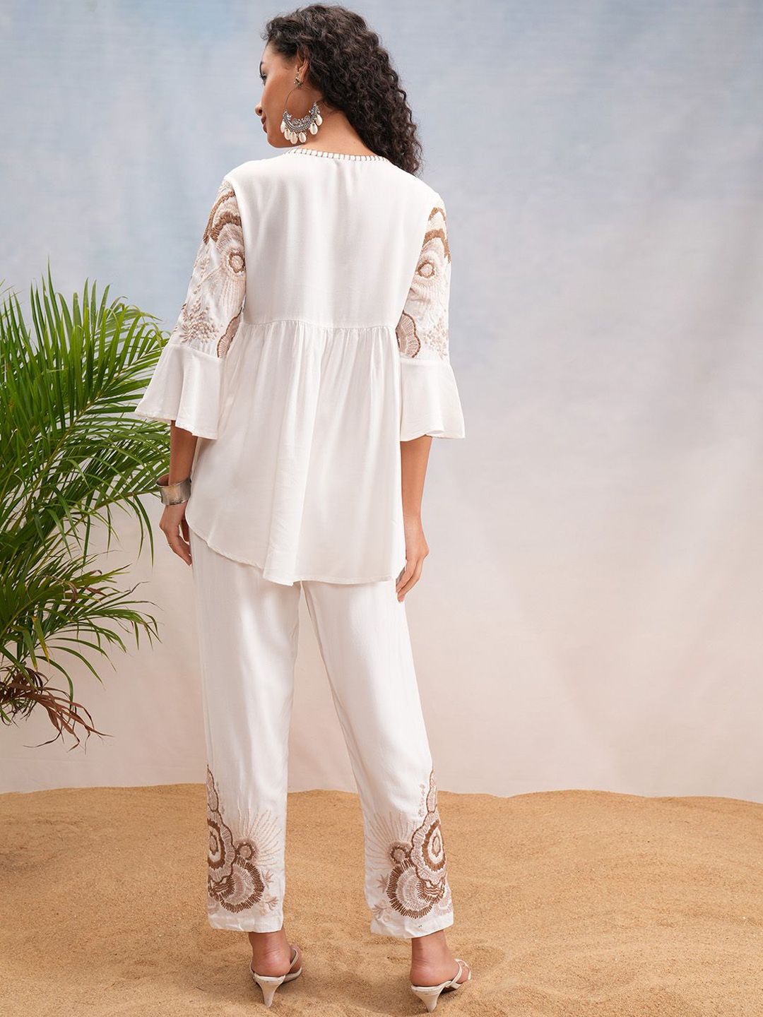 Vishudh Off White Floral Embroidered Bell Sleeves Tie-up Neck Tunic With Trousers