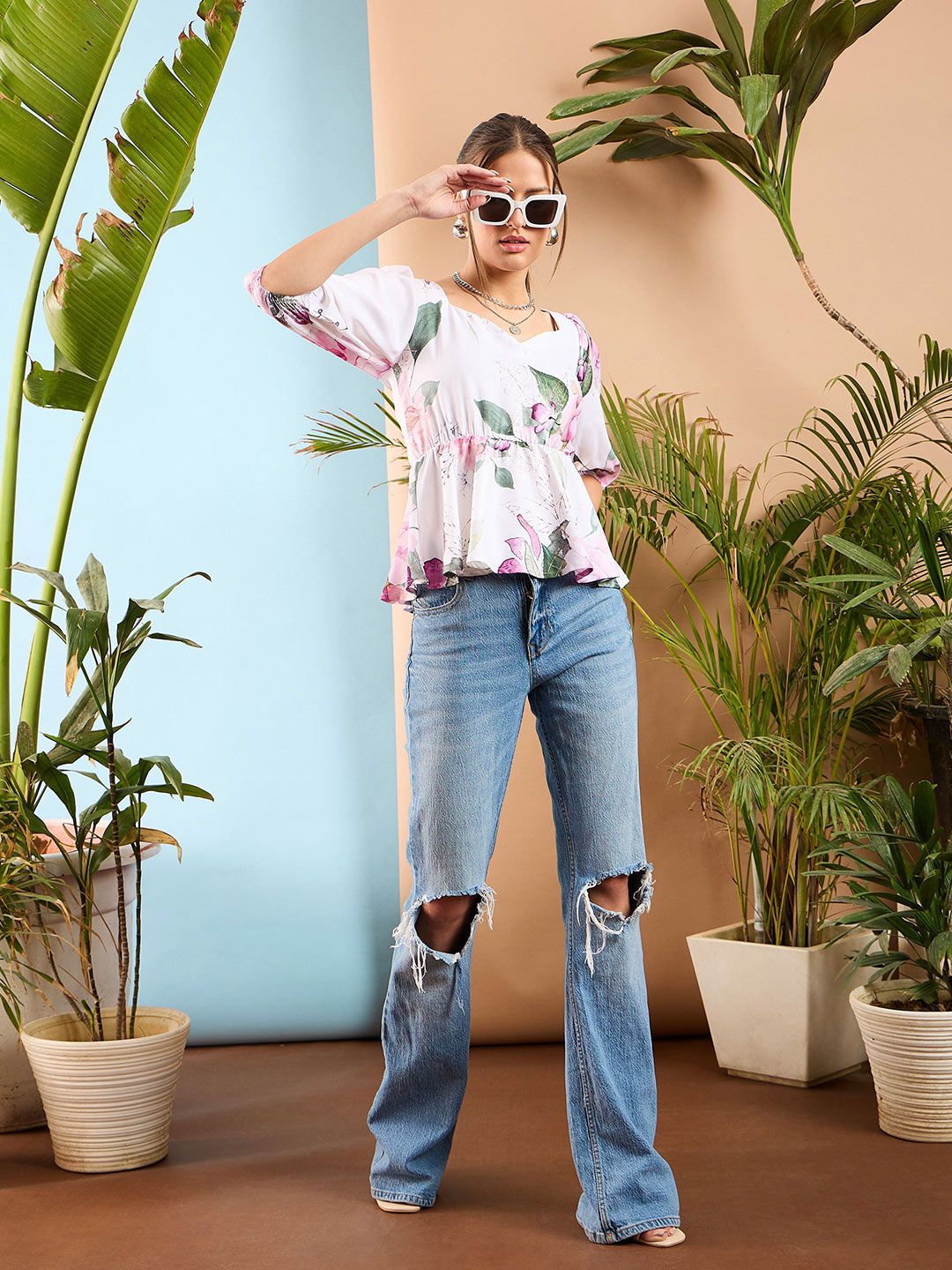 SASSAFRAS Floral Print Puff Sleeves Criss Cross Back Peplum Top