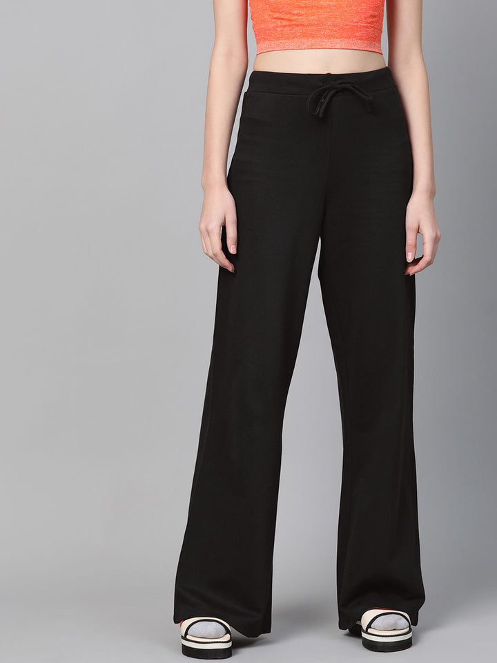 SASSAFRAS Women Black Regular Fit Solid Wide Leg Track Pants