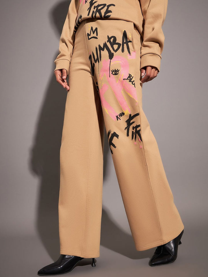 SASSAFRAS Women Beige Relaxed Fit Mid-Rise Typography Printed Fleece Track Pants