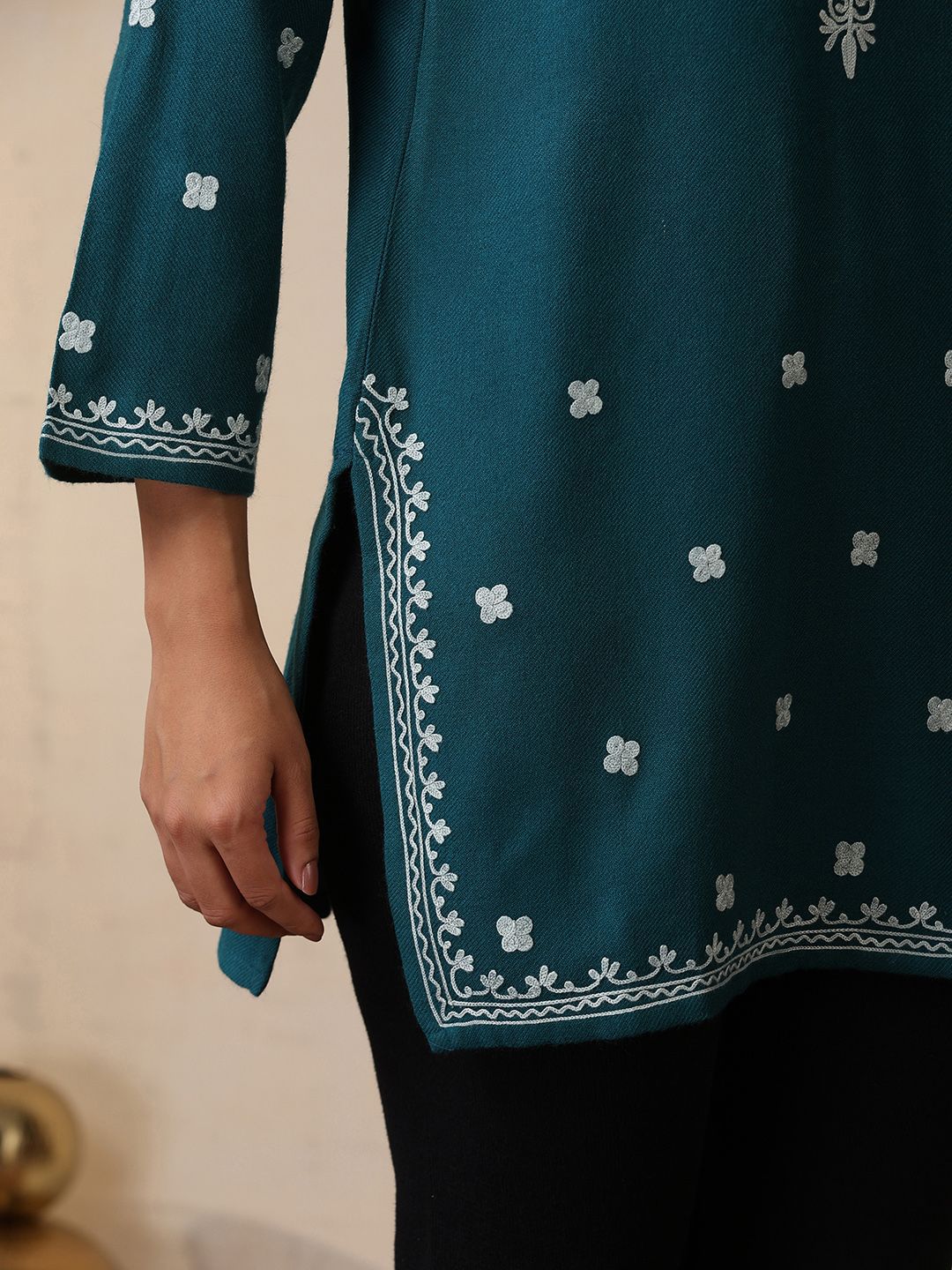 House of Chikankari Women Teal Woollen Aari Embroidered Kurti