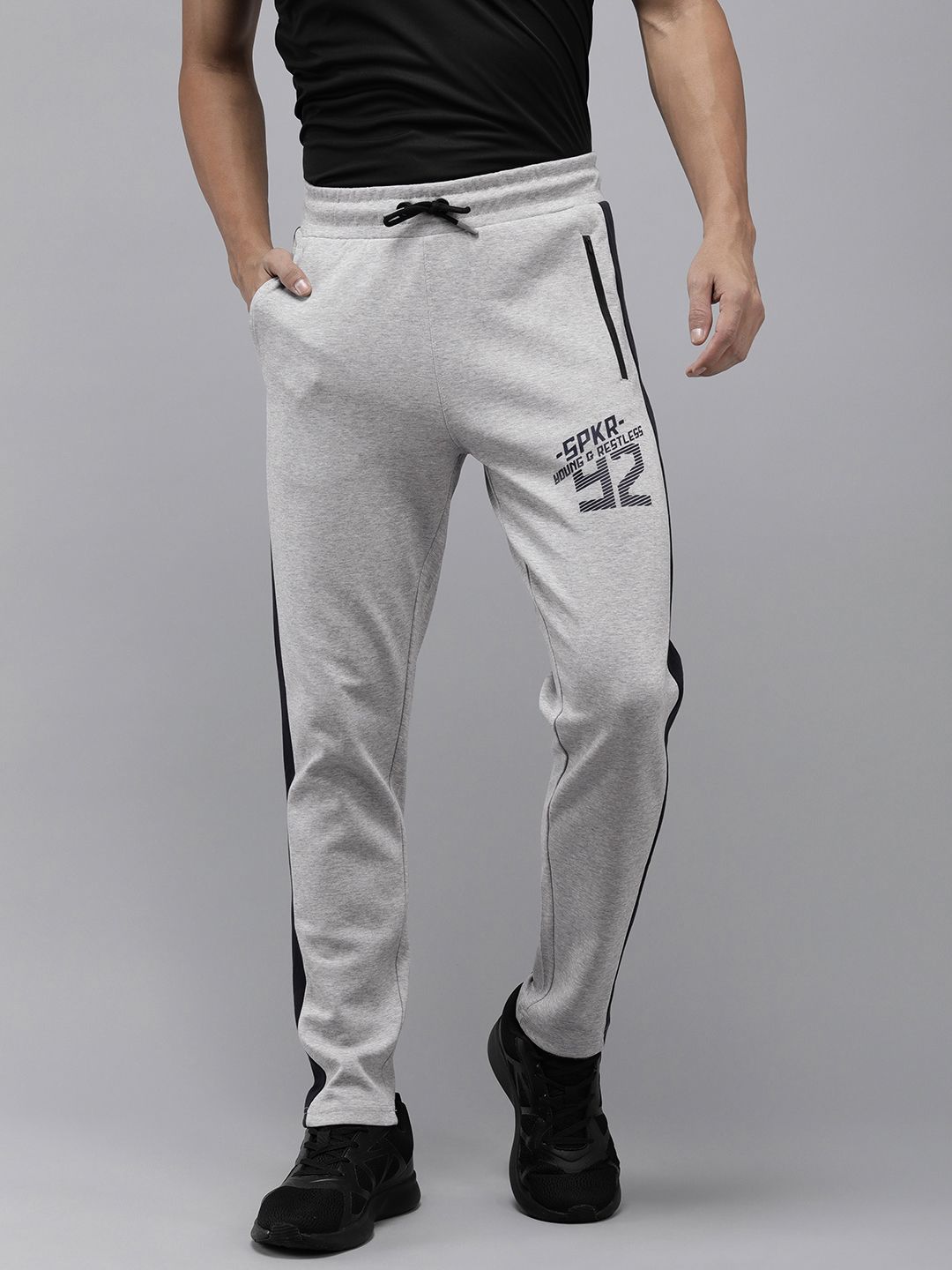 SPYKAR Men Solid Applique Slim Fit Track Pants With Side Stripes