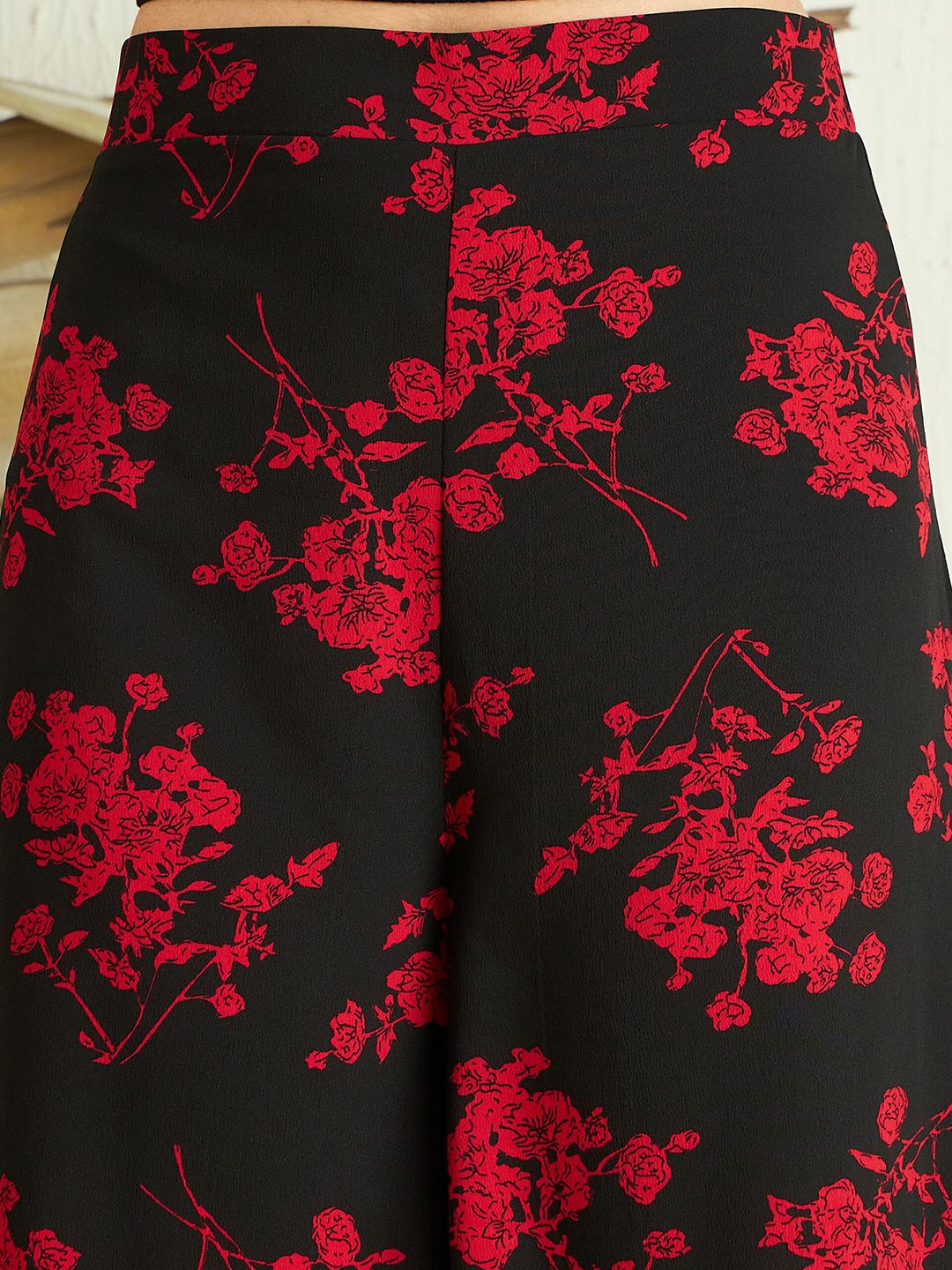 Berrylush Women Black Red Floral Printed Loose Fit High-Rise Parallel Trousers