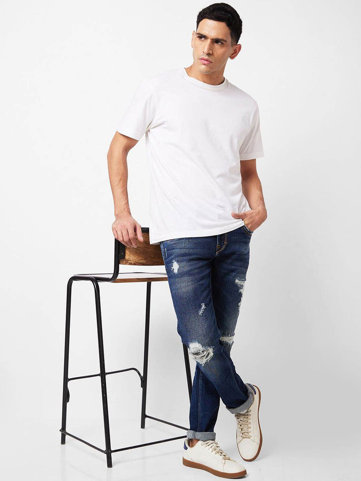 SPYKAR Men Mid-Rise Mildly Distressed Heavy Fade Ripped Jeans