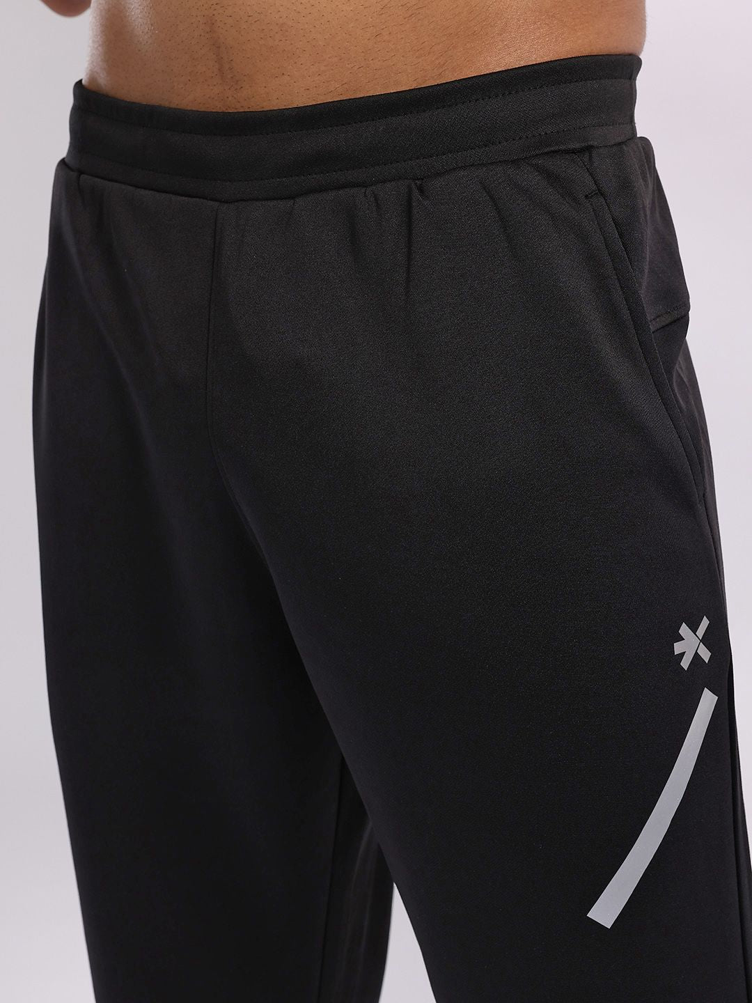 HRX by Hrithik Roshan Men Rapid-Dry Mid-Rise Regular Fit Running Track pants