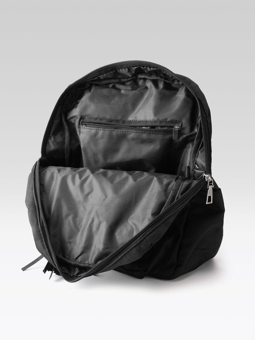 DressBerry Women Solid Tasselled Detail Backpack