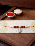 Voylla Divine Rudraksha Rakhi With Cowrie Shell
