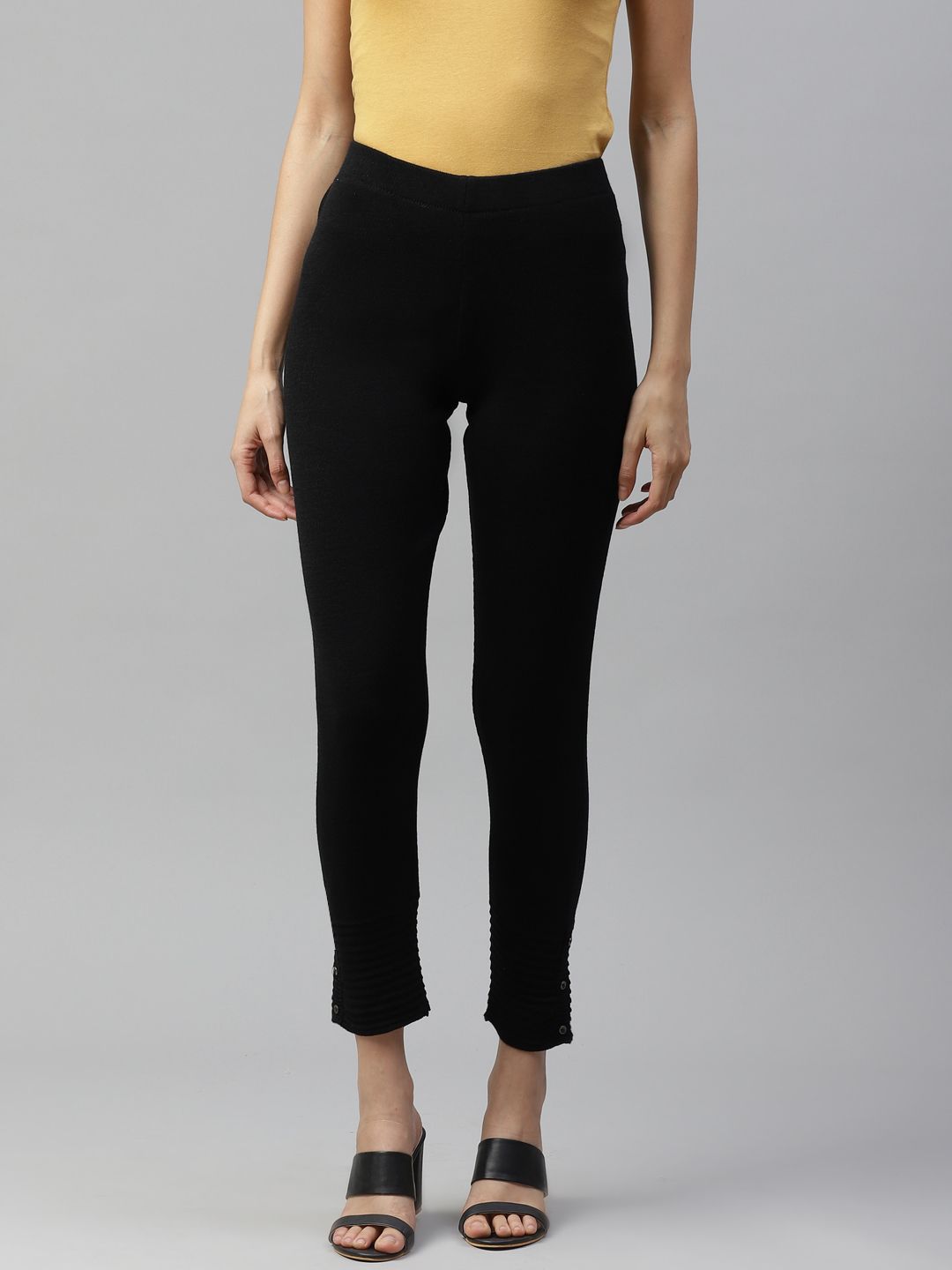 Women W Black Solid Cropped Leggings with Pintucked Hemline