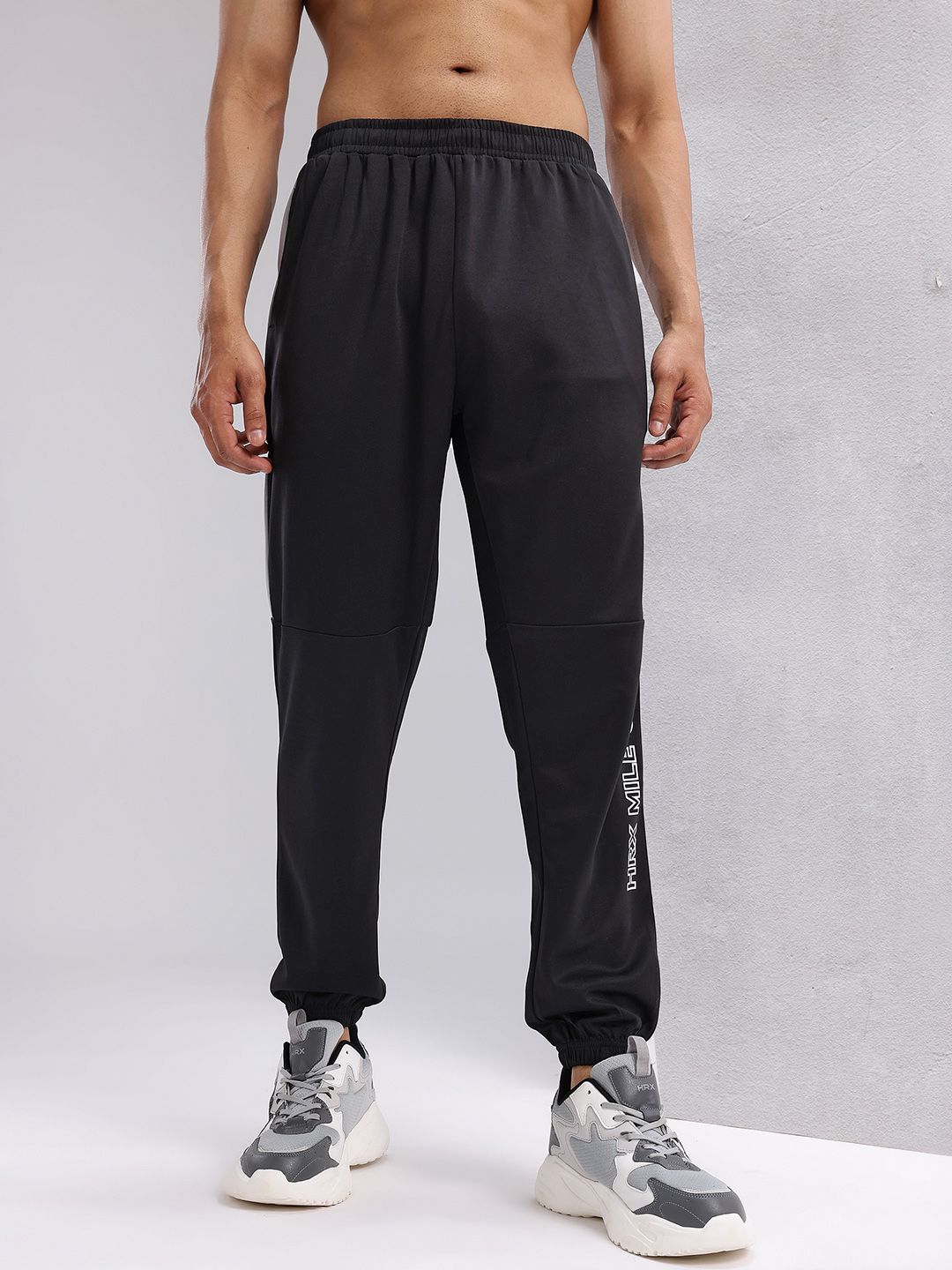 HRX by Hrithik Roshan Men Brand Logo Printed Mid-Rise Rapid-Dry Running Joggers