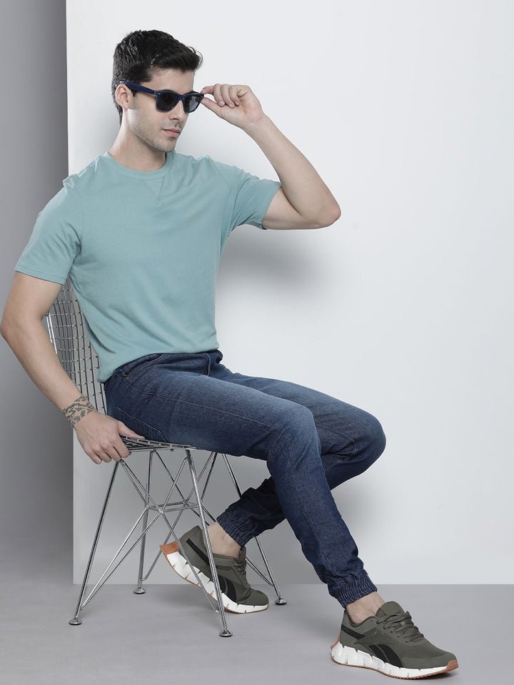 The Indian Garage Co Men Blue Light Fade Stretchable Jogger Jeans
