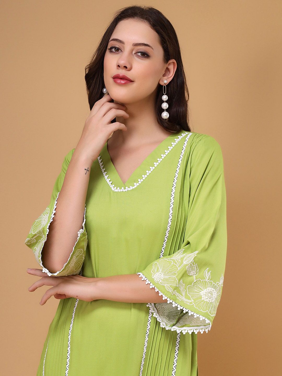 Bani Women Floral Embroidered V-Neck Lace Top & Flared Trouser