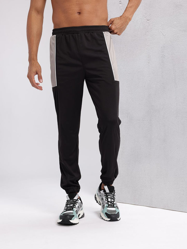 HRX by Hrithik Roshan Men Colourblocked Detail Mid-Rise Rapid-Dry Joggers