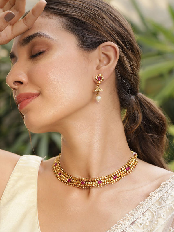 Rubans 22K Gold Plated Handcrafted Ruby Stone Studded and Gold Beaded Jewellery Set
