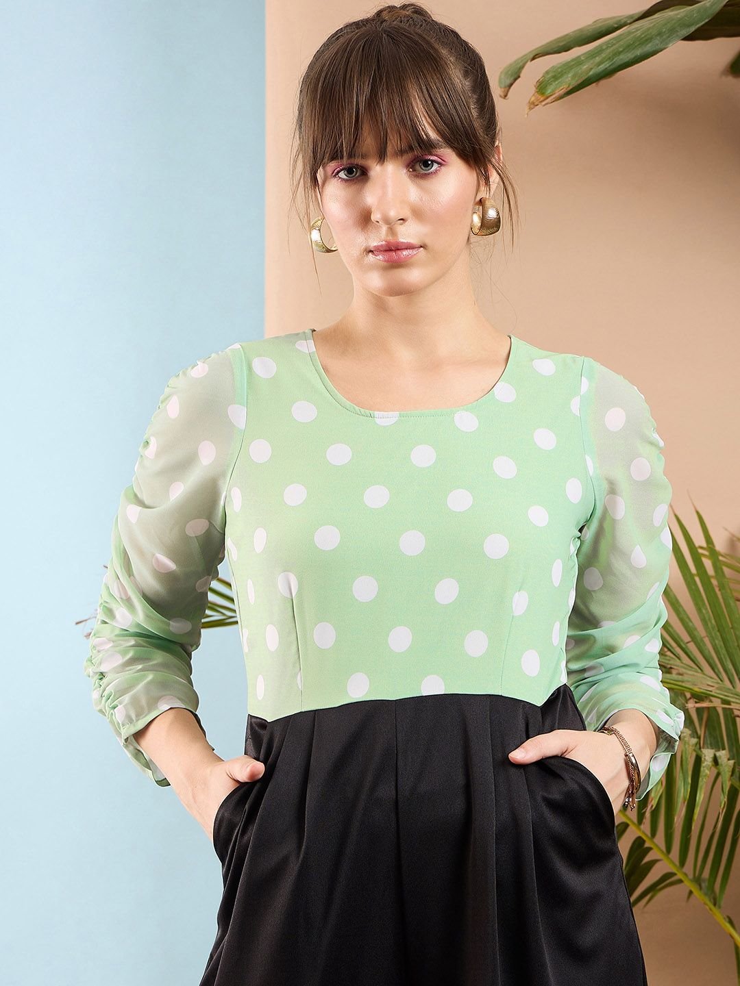 SASSAFRAS Sea Green and Black Colourblocked Smocked Jumpsuit