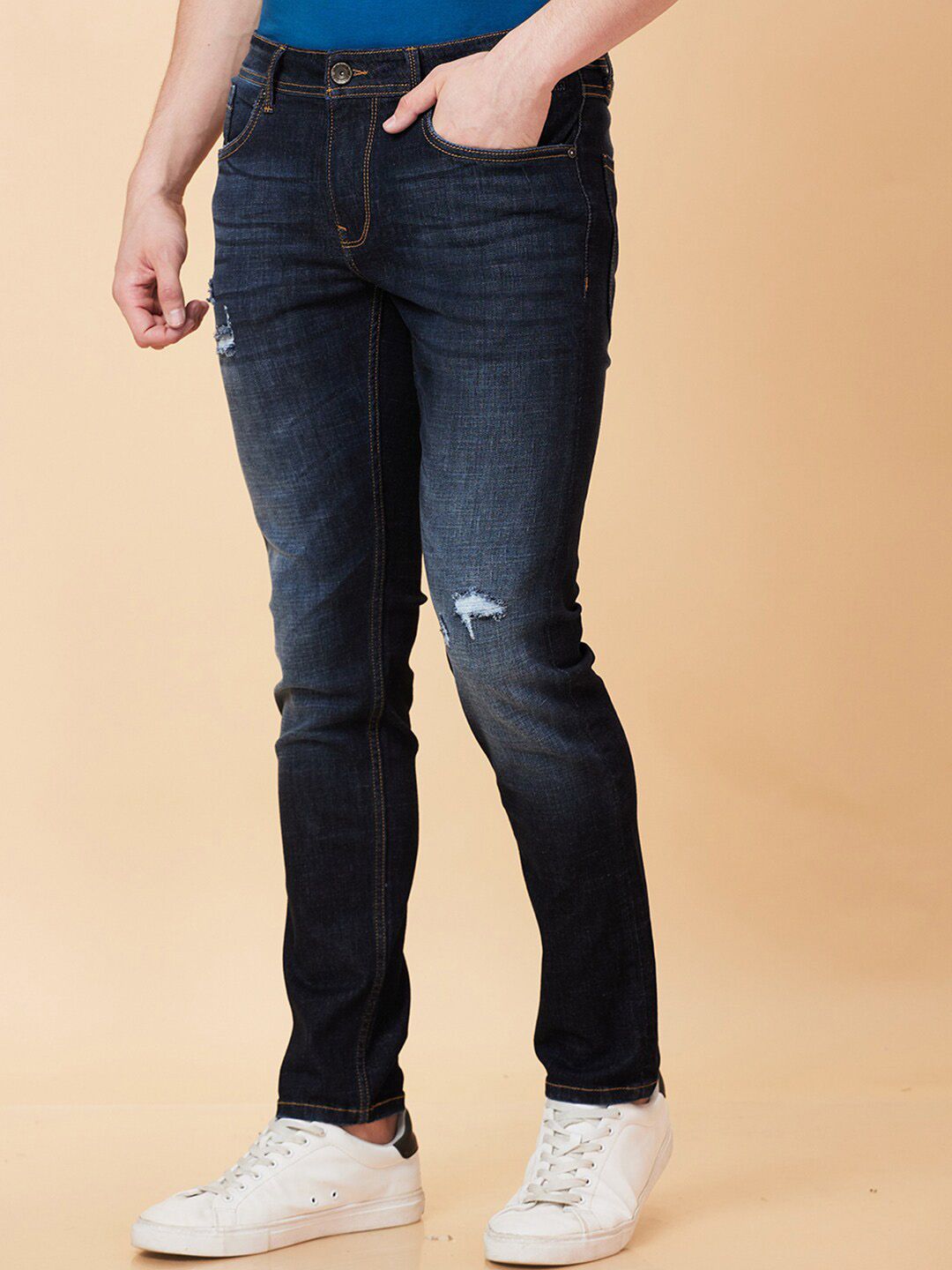 Being Human Men Skinny Fit Mid Rise Low Distress Light Fade Jeans