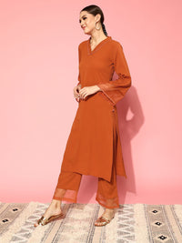 Varanga Rust Flared Sleeve Organza detailed V Neck Textured Kurta with Palazzo