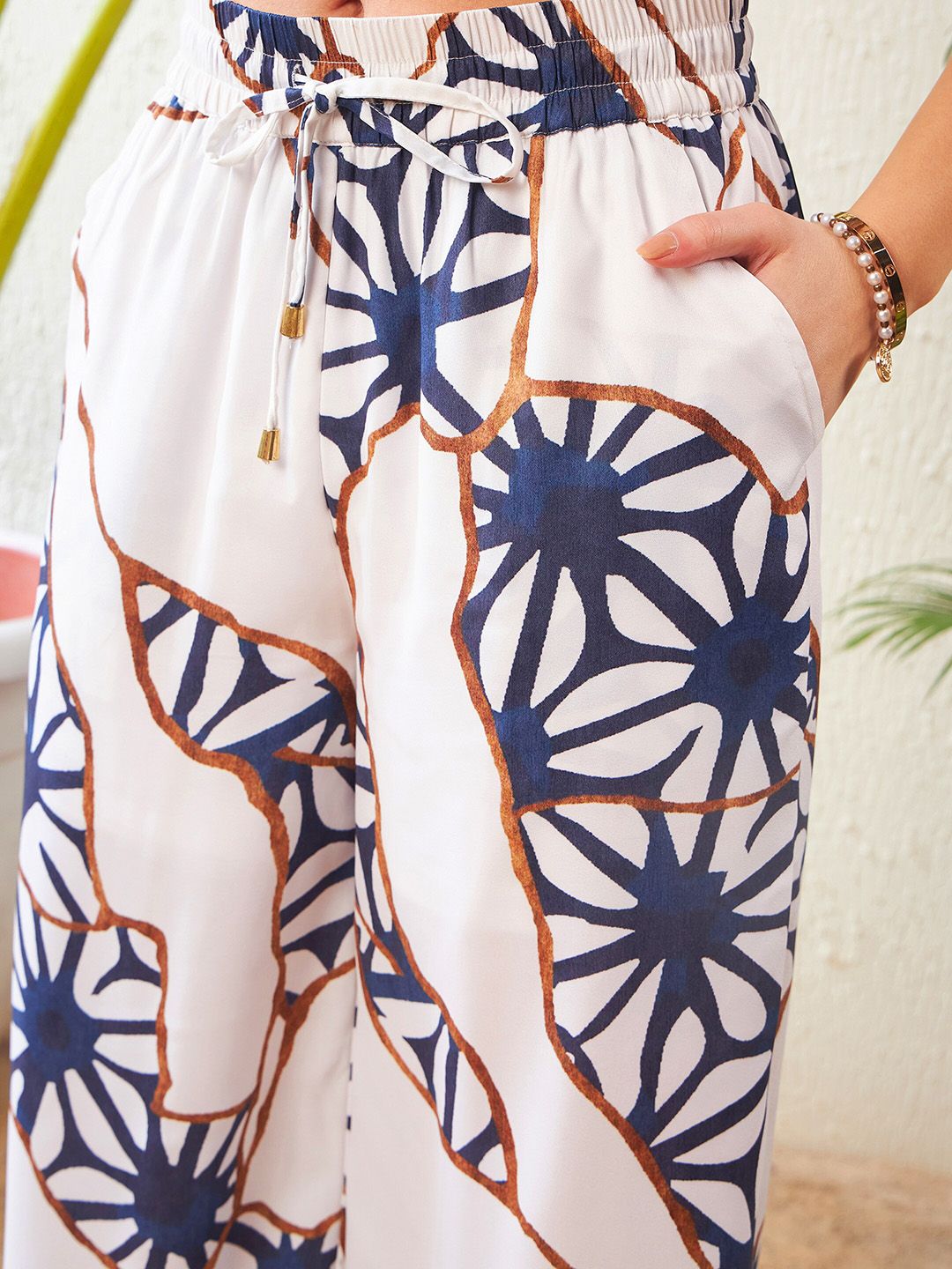 SASSAFRAS White Abstract Printed High Neck Top With Palazzos