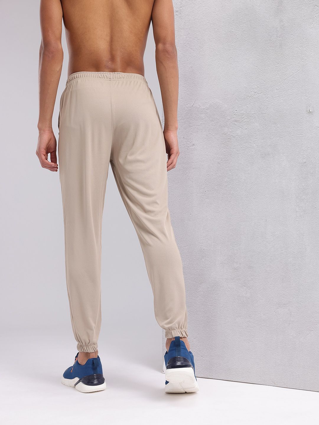 HRX by Hrithik Roshan Men Mid-Rise Brand Logo Detail Rapid-Dry Training Joggers