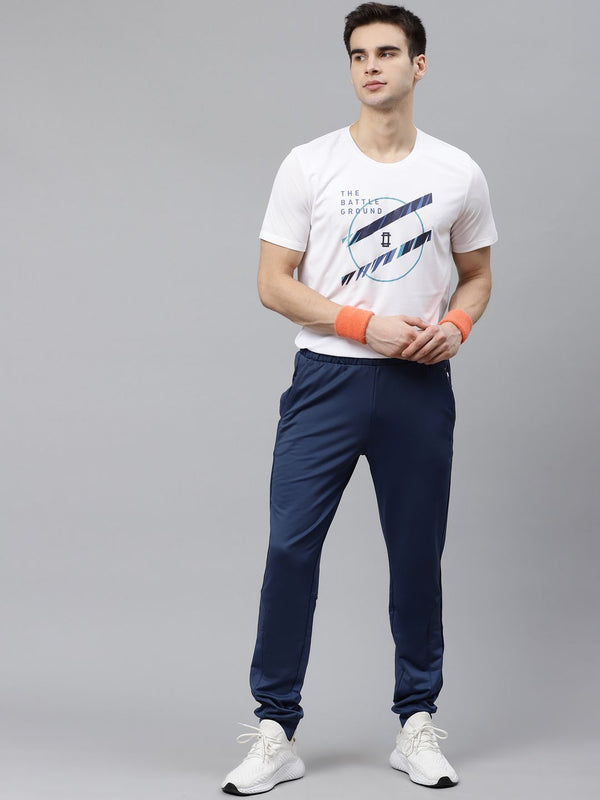 HRX oleh Hrithik Roshan Men White & Blue dicetak T-Shirt Kriket Anti-Statik yang cepat